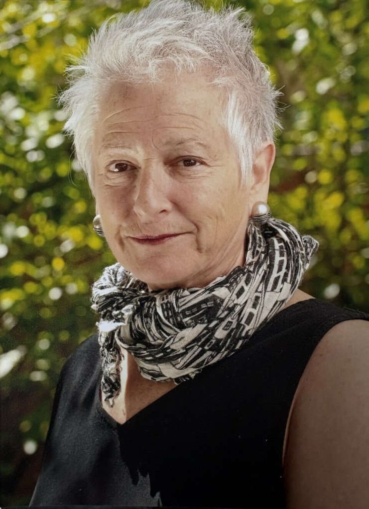 Photo of Robin Becker outside